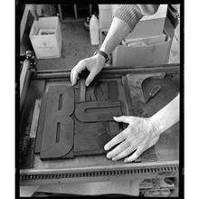 Jack Stauffacher at the Vandercook with wooden letters, 1999