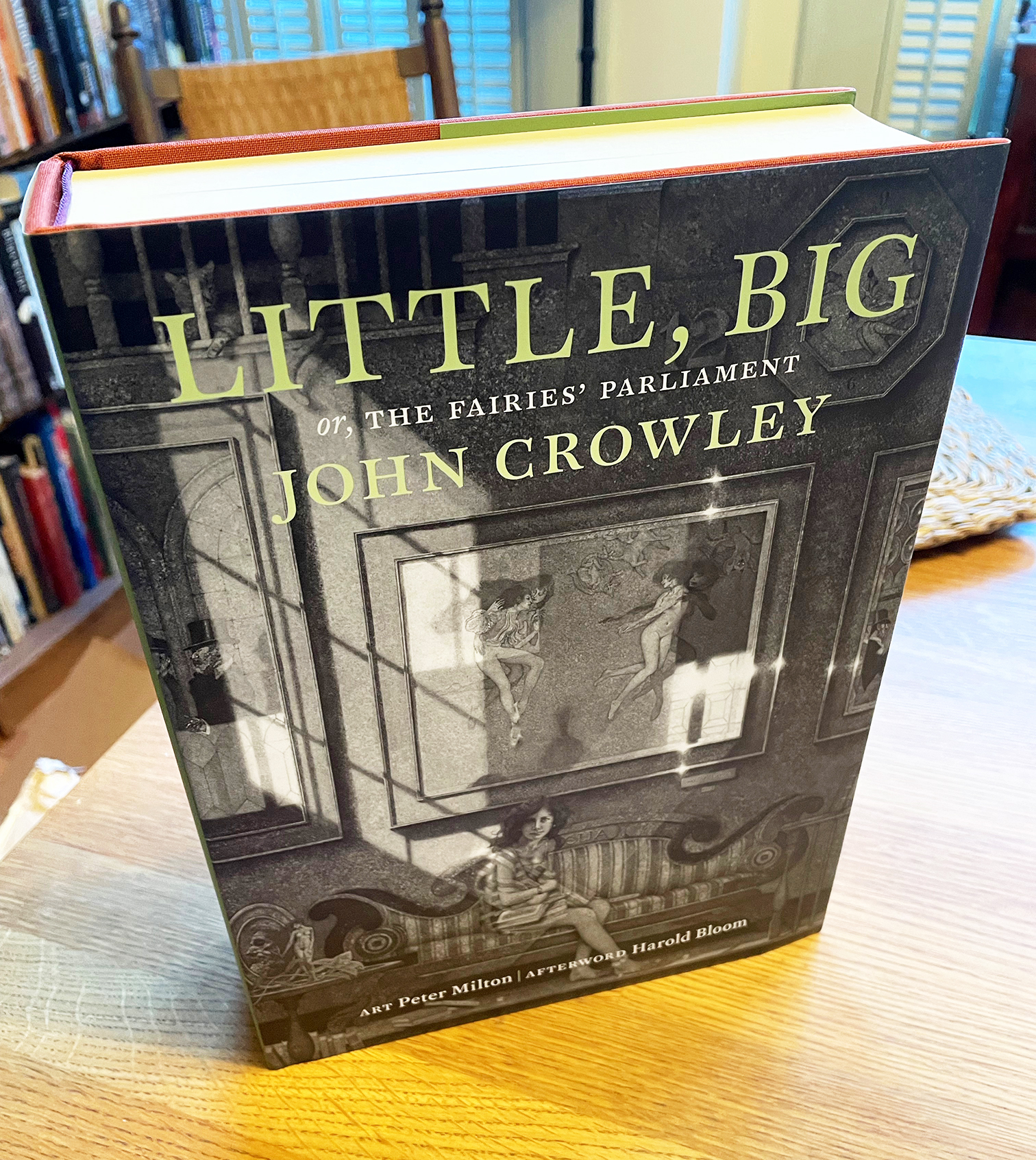 Incunabula trade edition of John Crowley's novel, Little, Big, displayed on table top