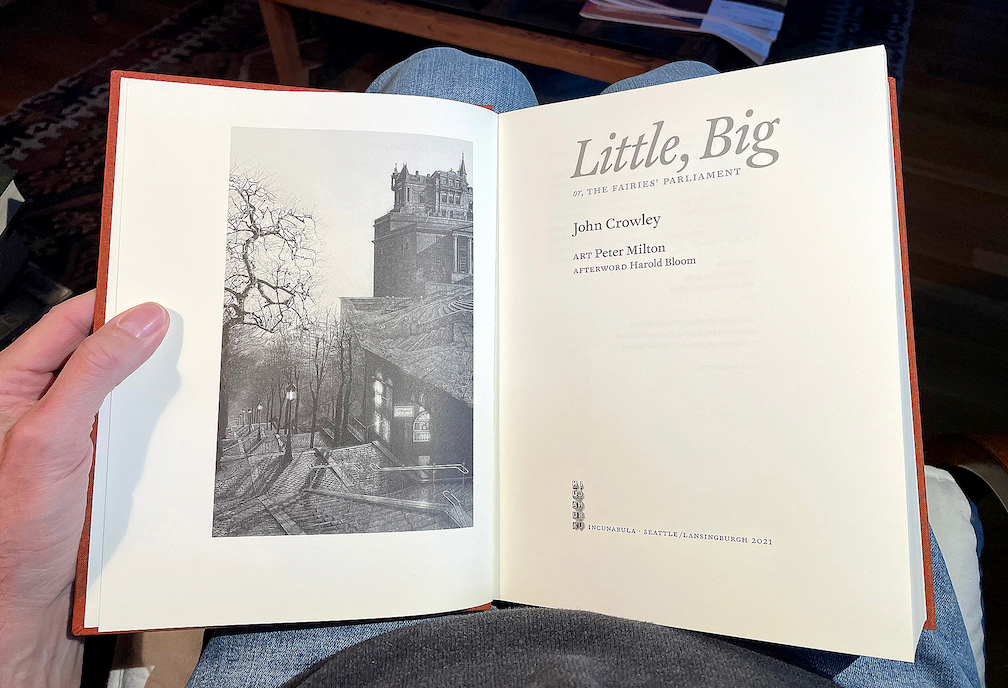 Title-page spread, held in lap, of the 40th anniversary edition of Little, Big