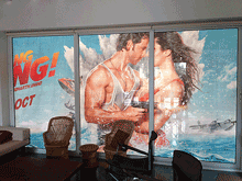 Bollywood poster covering sliding glass doors