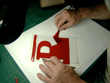Cutting the rubylith for a Letraset font